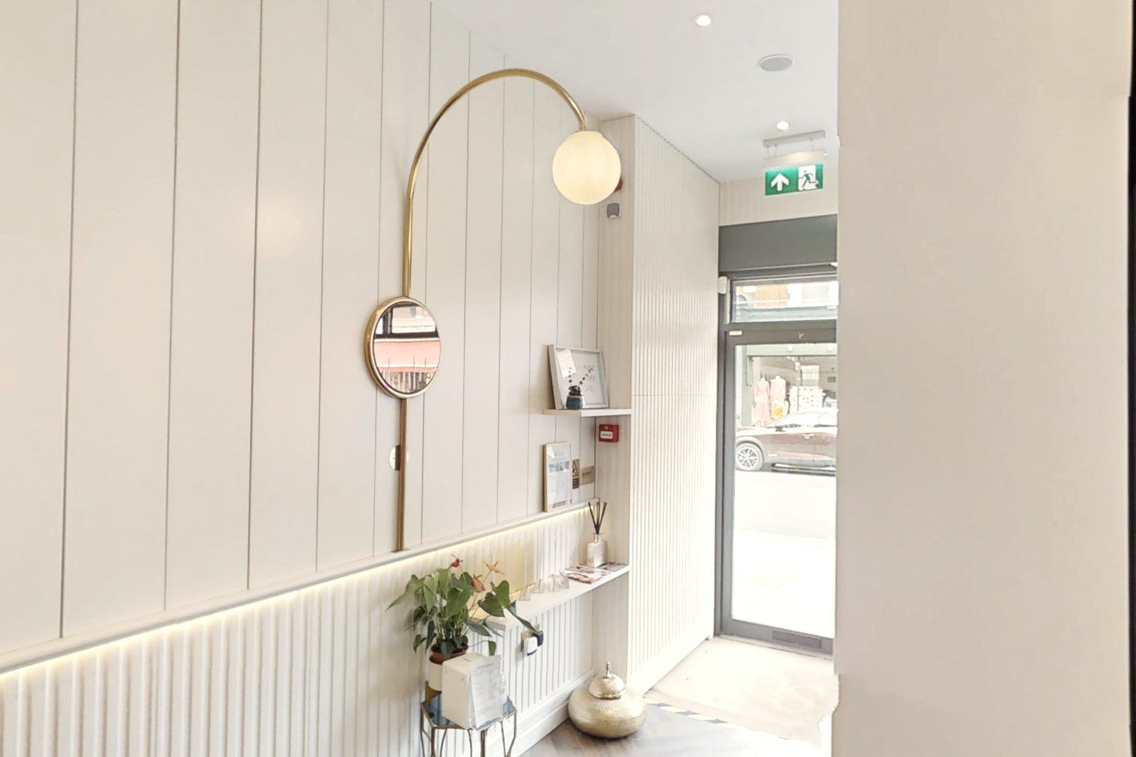 The panelled corridor at Shirland Dental Practice, with daylight from the street door